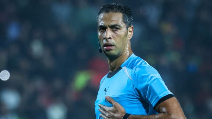 حكم الهلال والنجمة: حقيقة إيقاف أمين عمر وتأهيله لكأس العالم 2026